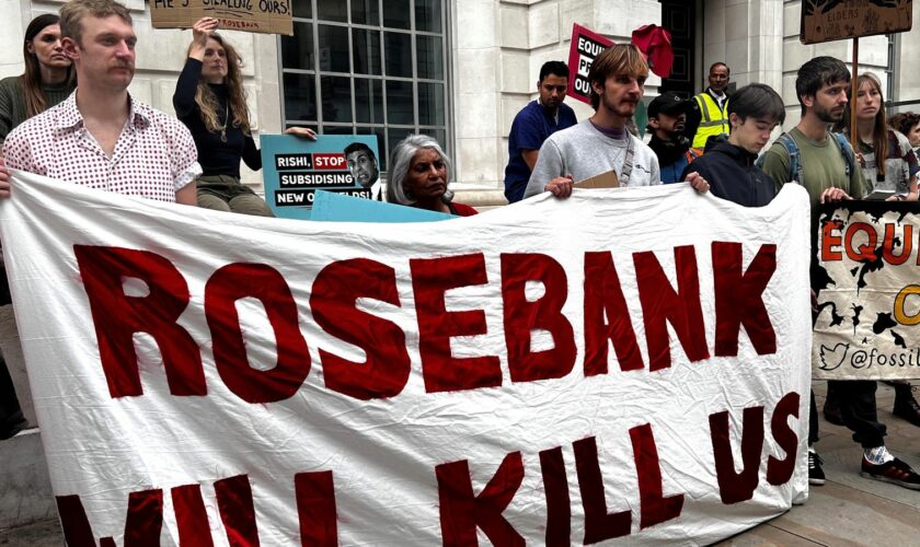 People protest outside the Department for Energy and Net Zero as the UK government grants a new license for Equinor to open up the biggest undeveloped oil field in the North Sea