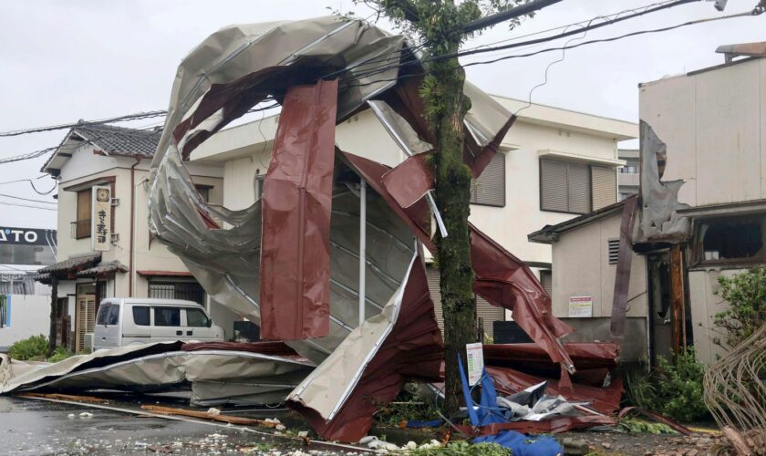 At least three dead as typhoon hits Japan and raises fears of flooding and landslides