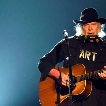 Neil Young explains tour cancellation, admits he 'felt sick' at the thought of going on stage