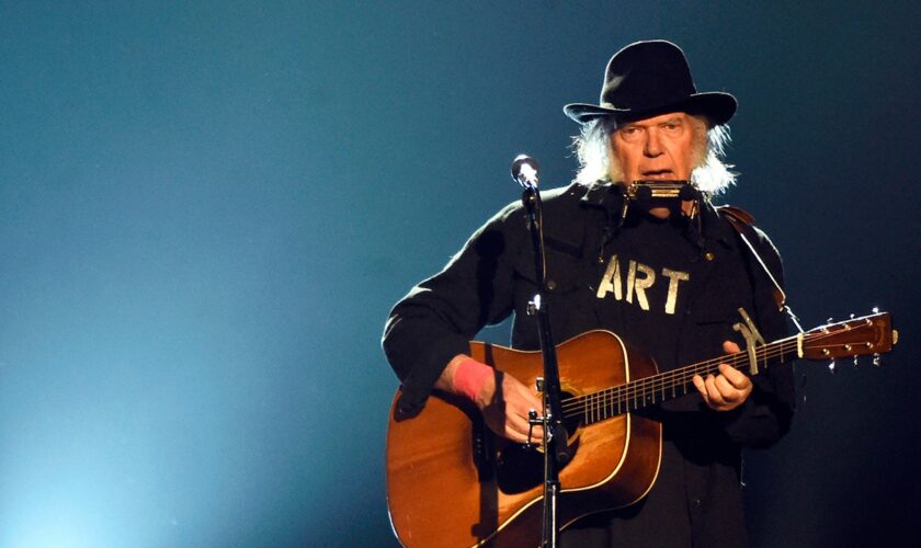 Neil Young explains tour cancellation, admits he 'felt sick' at the thought of going on stage