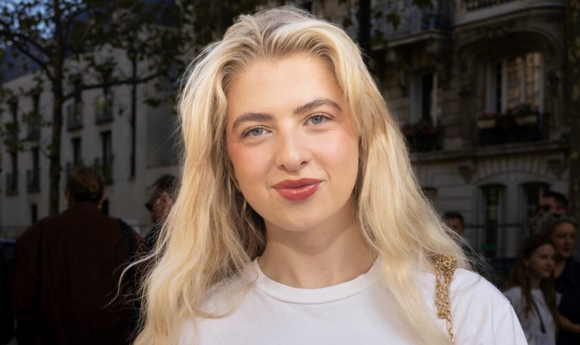 Anais Gallagher arrives for the Stella McCartney Spring/Summer 2024 womenswear fashion collection presented Monday, Oct. 2, 2023 in Paris. (AP Photo/Vianney Le Caer)