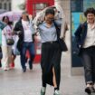 People walking in a rain shower on Whitehall in Westminster, London. Thunderstorms and hailstorms are set to sweep across parts of the UK on Thursday as temperatures reach up to 30C. Picture date: Thursday August 1, 2024. Pic: PA