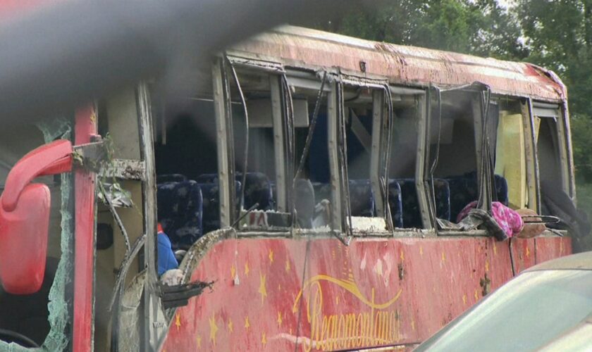 A damaged bus is shown after several people were killed and dozens injured after the commercial bus overturned on Interstate 20 early Saturday, Aug. 31 2024 in Warren County, Miss., according to the Mississippi Highway Patrol. (WAPT via AP)