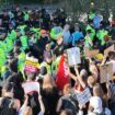 Anti-racism protesters protect Crawley hotel as delighted child waves from window