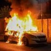 Boy, 11, is arrested on suspicion of arson after police car was set alight during protests in Hartlepool