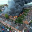 Boy, 12, arrested for 'arson' after huge fire causing hundreds of homes to be evacuated