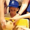 Boy, 4, who smashed priceless 3,500-year-old jar returns to museum to watch repairs