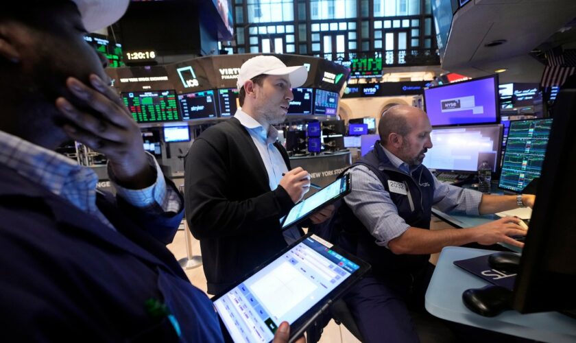 Dow slides almost 500 points as Wall Street frets over economic data