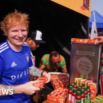 Ed Sheeran hands out pies to Ipswich Town fans