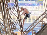 Eiffel Tower is evacuated after man seen climbing iconic Paris landmark just hours before Olympics closing ceremony