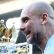 Manchester City manager Pep Guardiola with the Premier League trophy