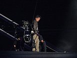 Hollywood legend Tom Cruise jumps from the ROOF the stadium in death-defying stunt during extravagant handover ceremony that transformed the Hollywood sign into Olympic rings before performances from Billie Eilish Red Hot Chili Peppers and Snoop Dogg