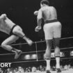 Antonio Inoki is in mid air aiming a kick at Muhammad Ali's legs.