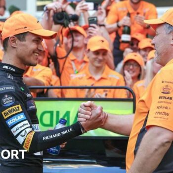 McLaren driver Lando Morris celebrates victory in the Miami F1 Grand Prix with team boss Zak Brown