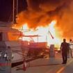 Millions of pounds goes up in smoke: Moment massive inferno destroys two luxury superyachts and a tourist boat at Greek port