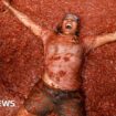 'Mind-blowing': Thousands bathe in tomato sauce at La Tomatina