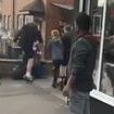 Moment 'gang of feral children' attack man, knocking him to the floor before stamping on his head in sickening assault outside of barber shop