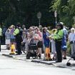 Mourners line the streets as horse-drawn carriage carries coffin of nine-year-old Alice da Silva Aguiar who was stabbed to death at Taylor Swift dance class in Southport