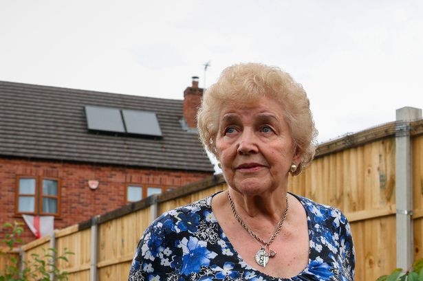 Nan's vendetta over 90cm piece of land stopping mum from selling her home