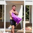 On-the-run Tommy Robinson suns himself at an all-inclusive five-star hotel in Cyprus while his foot soldiers run riot in violent protests across Britain - as Keir Starmer takes aim at those 'whipping up action online and then running away'