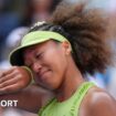 Naomi Osaka wipes away a tear at the US Open