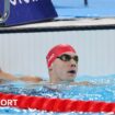 Great Britain's William Ellard raising his hand after he won his S14 butterfly heat this morning