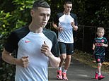 Phil Foden enjoys a run with his son Ronnie, 5, as the Man City star is seen for the first time since neighbours 'called police over late night children's party at his £3M Cheshire mansion'