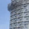 Second London tower block is ravaged by a blaze: Dozens of firefighters rush to tackle inferno at 45-storey high-rise - hours fire in nearby Dagenham flats sparked a major evacuation