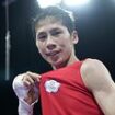 Second gender row boxer Lin Yu-Ting is GUARANTEED an Olympic medal after winning featherweight quarter-final amid eligibility furore