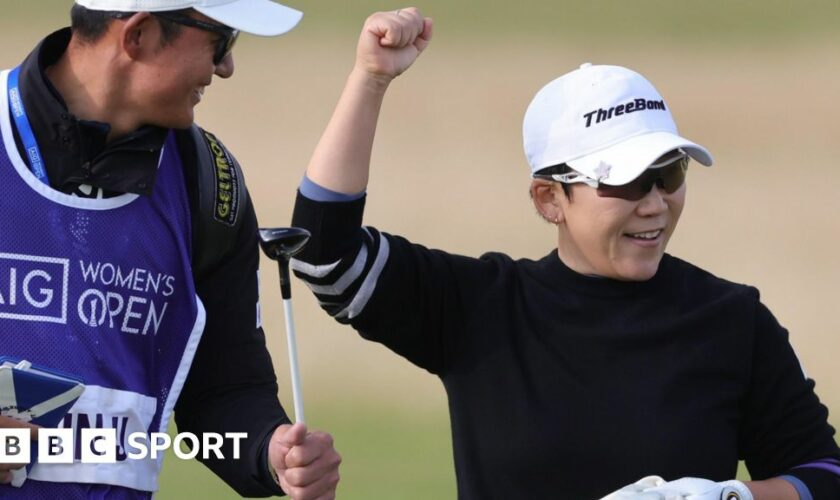 Jiyai Shin celebrates with her caddie during the third round of the 2024 Women's Open