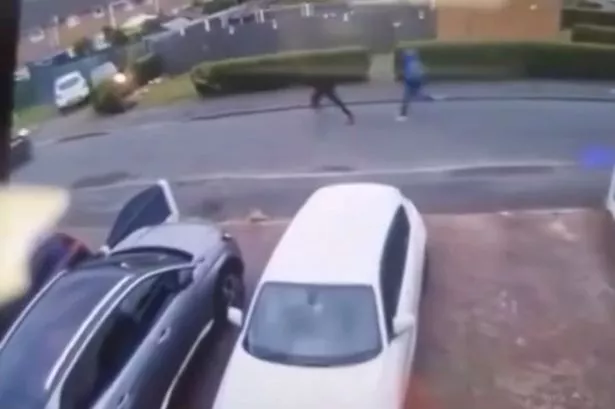 Shocking moment man is shot in back after his car was rammed off road