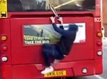 Shocking moment youth armed with a large knife clings to the back of a double-decker bus in Brighton as he hitches a ride around town