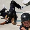 Sky Brown clutches onto her shoulder which she dislocated just over a week ago after she FALLS off her skateboard during preliminary round ahead of today's final