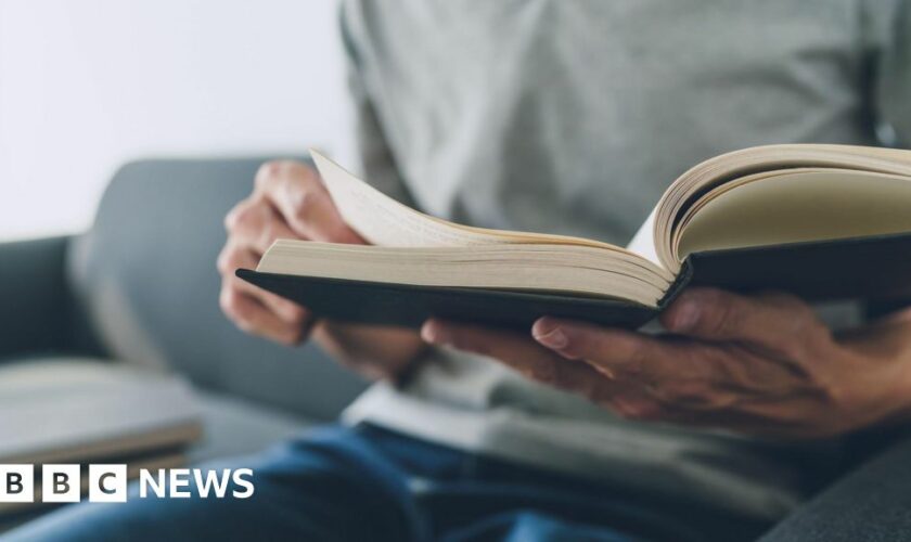 Suspected burglar caught after sitting down with book