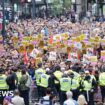 Thousands of counter-protesters rally after riots