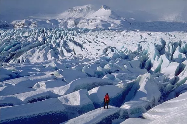 Tourist dies and two others missing in Iceland as ice cave collapses during tour