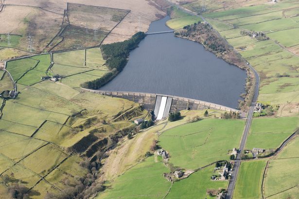 Underneath the reservoir that hides a secret village and is surrounded by woodland