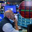 Wall Street stages 'Turnaround Tuesday' after biggest sell-off in two years - but JPMorgan warns stock market rout is only 'half complete'