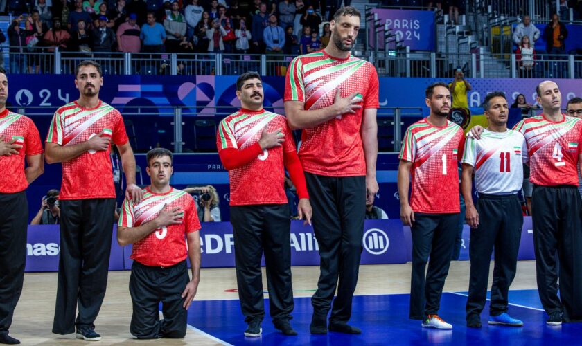 Morteza 'Mehrzad' Mehrzadselakjani with his teammates in Paris on 30 August. Pic: AP