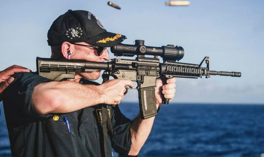 US Navy warship commander relieved of duty following image of him shooting rifle with scope mounted backward