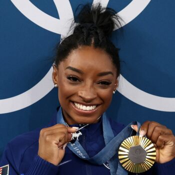 Simone Biles acknowledges diamond-studded GOAT necklace 'p---es people off'