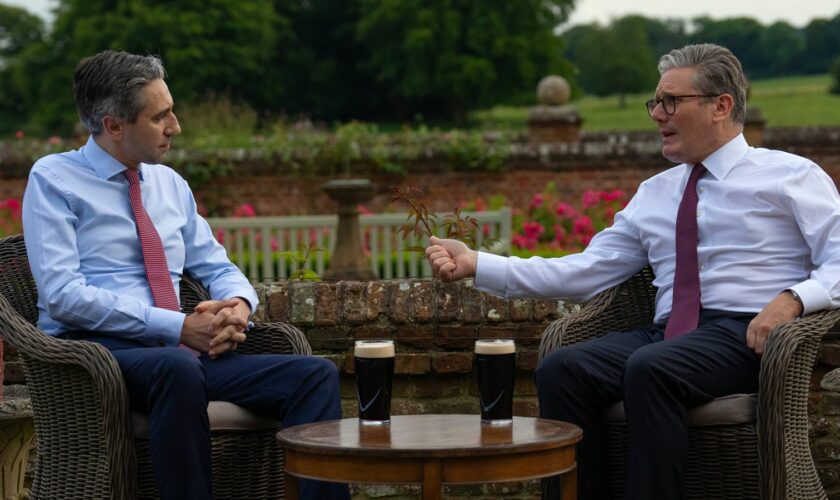 Prime Minister Sir Keir Starmer (right) and Taoiseach Simon Harris drink a pint of Guinness during his visit to Chequers, the country house of the serving Prime Minister of the United Kingdom, near Aylesbury, Buckinghamshire. Picture date: Wednesday July 17, 2024. PA Photo. See PA story POLITICS Ireland. Photo credit should read: Carl Court/PA Wire.