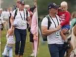 Royal rascals! Mike Tindall breaks up play fight between daughter Lena, 6, and son Lucas, 3, as the family arrive to cheer on Zara at the Burghley Horse Trials