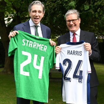 Sir Keir Starmer and Irish Taoiseach Simon Harris exchange football shirts in Dublin on Saturday. Pic: PA