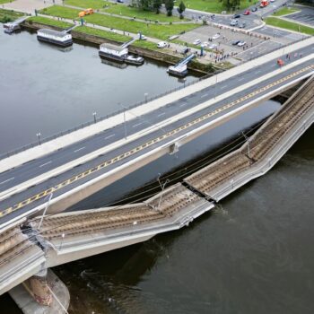 Parts of the Carola Bridge over the Elbe have collapsed in Dresden, Germany, Wednesday, Sept. 11, 2024. (Robert Michael/dpa via AP)