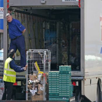 A delivery lorry outside a Tesco Express store in central London. Pressure is mounting on the Government to bring forward the date at which people who are double vaccinated against coronavirus can avoid self-isolation as emergency measures to protect food supplies were launched on Thursday. Picture date: Friday July 23, 2021.