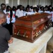 Family members mourn and react next to the coffin of the slain Olympian Rebecca Cheptegei, who died after her former boyfriend doused her in petrol and set her ablaze, at the Moi Teaching & Referral Hospital (MTRH) funeral home, in Eldoret, Kenya September 13, 2024. REUTERS/Edwin Waita