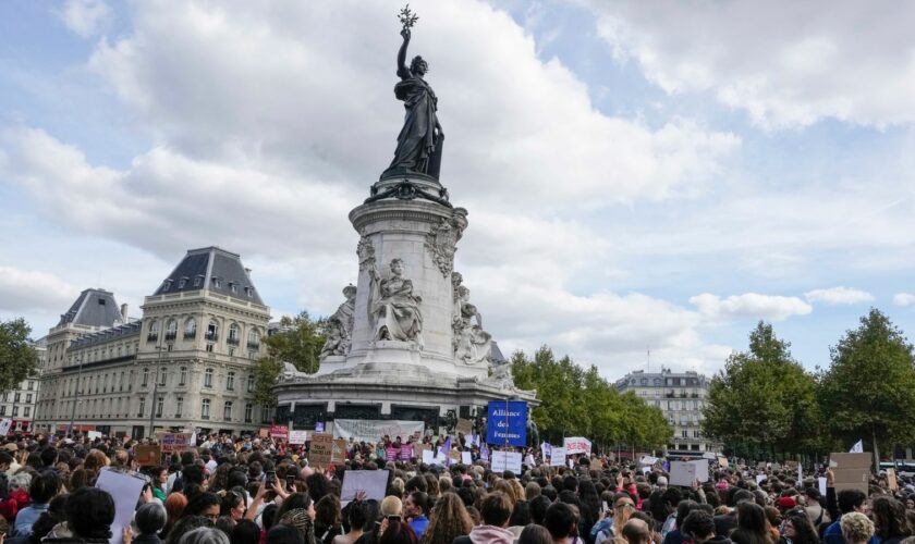 People take part in a gathering at Place de la Rebublique in support of 71-year-old Gisele Pelicot who was allegedly drugged by her ex-husband and raped by dozens of men while unconscious, Saturday, Sept. 14, 2024 in Paris.  (AP Photo/Michel Euler)