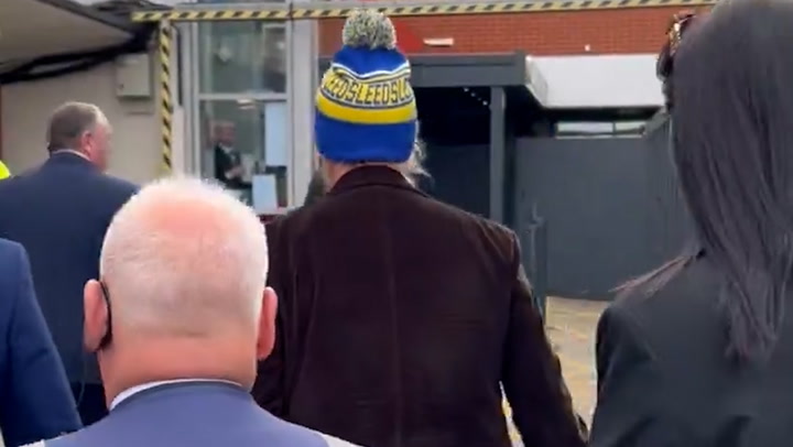 Hollywood actor dons Leeds United bobble hat as he arrives at Elland Road