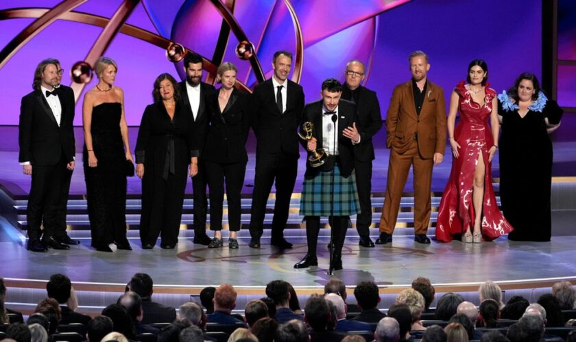 Richard Gadd, center, and the team from "Baby Reindeer" accept the award for outstanding limited or anthology series during the 76th Primetime Emmy Awards on Sunday, Sept. 15, 2024, at the Peacock Theater in Los Angeles.(AP Photo/Chris Pizzello)